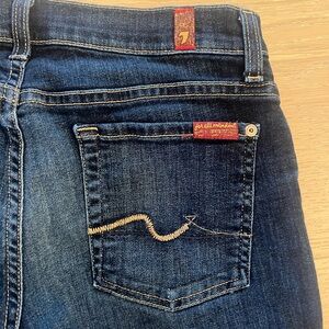 7 For All Mankind Blue Jeans with Subtle Fading and Golden-Tan Stitching